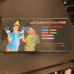 LED flashing gloves new in box, sealed, gloves fit kids between ages 4-8
